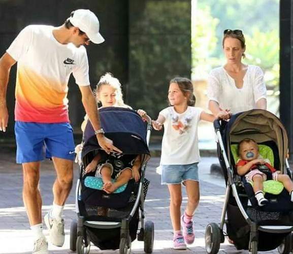 Mirka Federer with her husband, Roger Federer, and their four children
