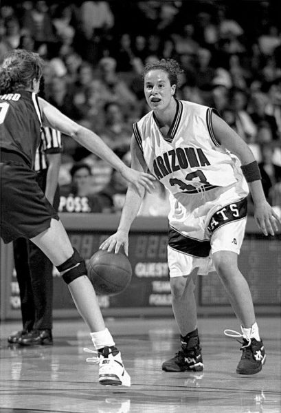 Andrea Constand playing basketball