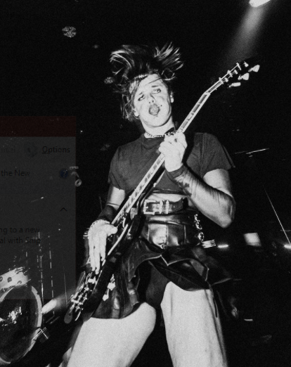 Yungblud playing with guitar 