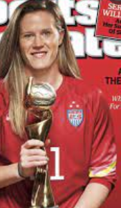 Alyssa Naeher posing for the photo with the cup