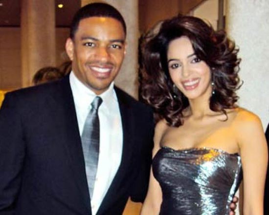 Caption: Laz Alonso with his friend 