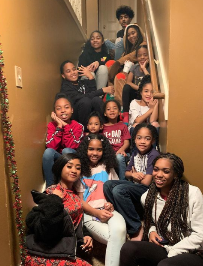 Young Lyric with her friends and sisters 