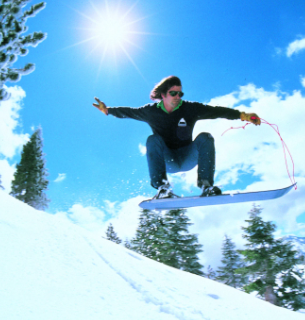 Jake Burton Carpenter playing with snowboards