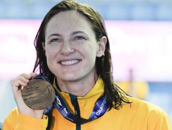 Cate Campbell showing her medal