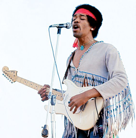Late Jimi Hendrix singing at the stage