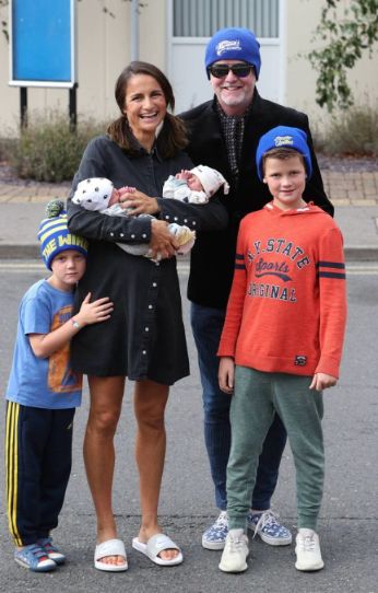 Natasha Shishmanian with her husband, Chris Evans and their children
