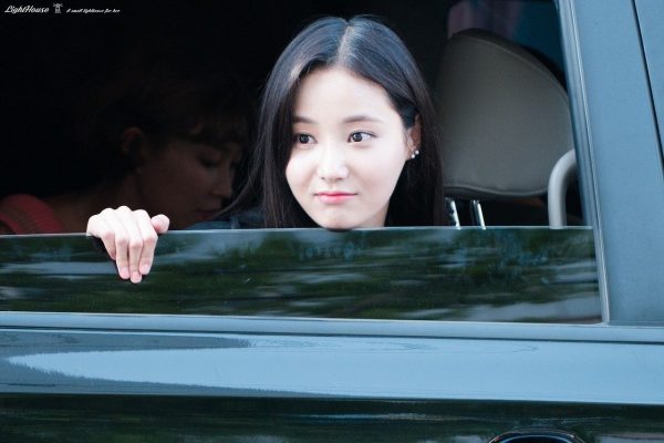 Yeonwoo sitting inside the car