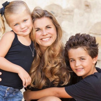 Rob Pelinka's wife, Kristin Schwarz, and their children