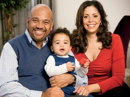 Sheryl Wilbon with her husband, Michael Wilbon, and their son