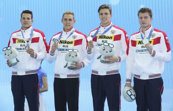 Aleksandr Krasnykh posing for a photo with his friends