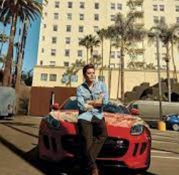 Dominic Sherwood with the car