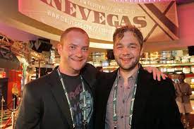 Evan Helmuth posing for the photo with his friend