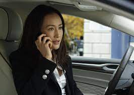 Maggie Q inside the car