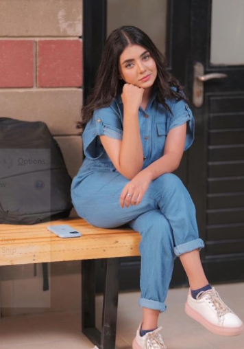 Areeka Haq posing for a photo 