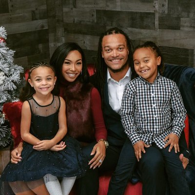 Channing Crowder with his wife, Aja Crowder, and their children