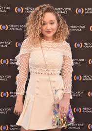 Mecca White posing for a photo 