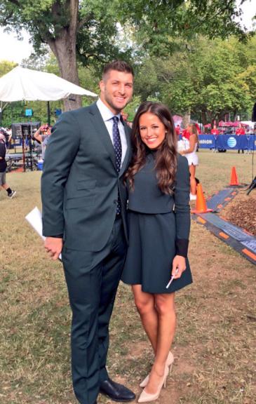 Kaylee Hartung with Tim Tebow