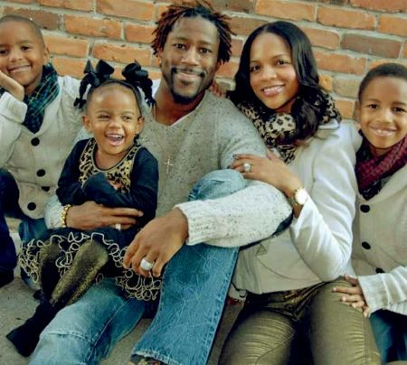 Nate Burleson with his wife, and their children