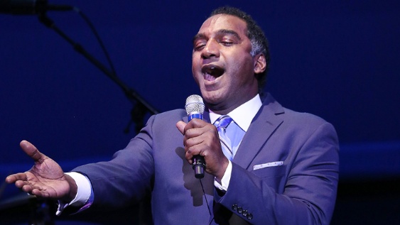 Norm Lewis while singing at stage