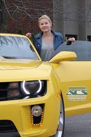 Elisha Cuthbert with the car