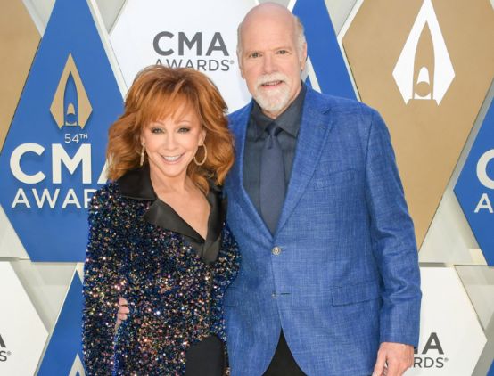 Rex Linn with his wife, Reba McEntire