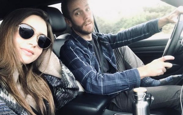 Charlie McDowell and his wife inside the car