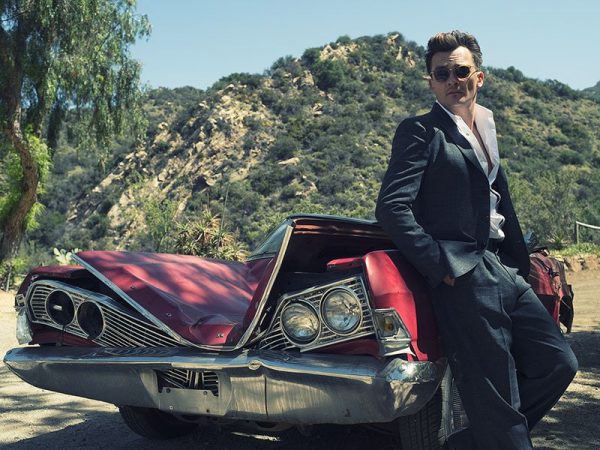 Rupert Friend with the car