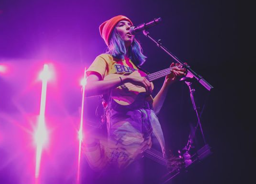 Miss Bee singing at the stage 