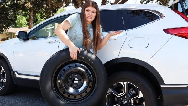 AllAroundAudrey posing for the photo with the car