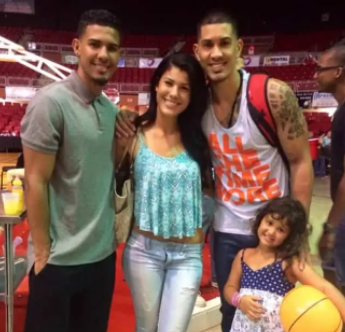 Nilmarie Huertas with her brothers