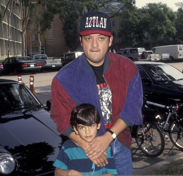 Paul Rodriguez standing outside his car