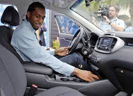 Kawhi Anthony Leonard sitting inside his car