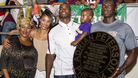 Adrian Peterson with his family 