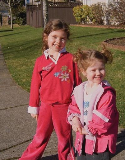 Alisha Newton's childhood photo with her sister, Mckenzie