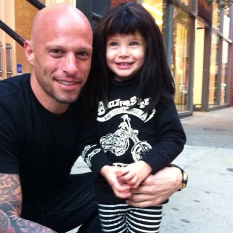 Ami James with one of his daughters