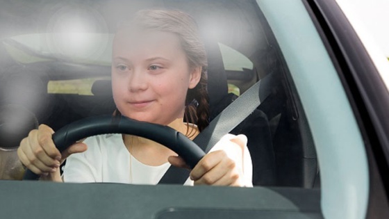 Greta Thunberg driving her car
