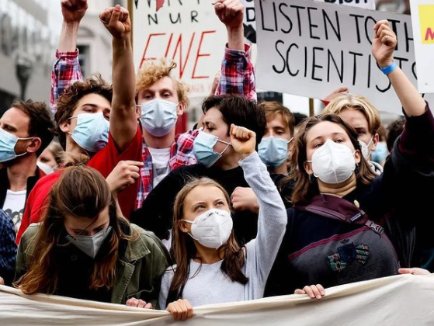 Greta Thunberg protesting with the public