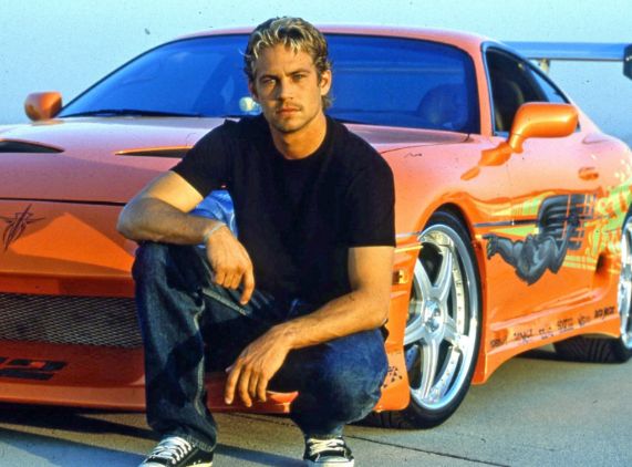 Jasmine Pilchard-Gosnell's ex-boyfriend, Paul Walker posing with his car