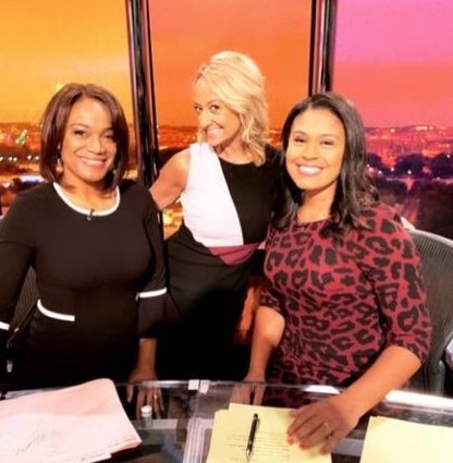 Meagan Fitzgerald with her co-workers