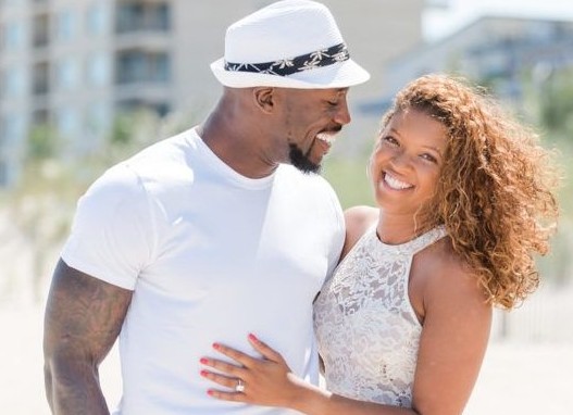 Vernon Davis with his partner, Kayla Sortor