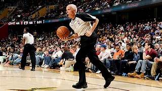 Dick Bavetta posing for the photo while playing basketball