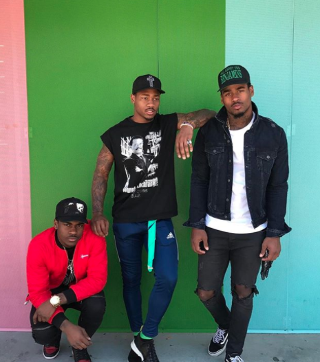 Stefon Diggs posing for photo with his friends