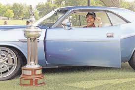 Kevin Na inside the car