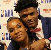 Alize Johnson with his friend