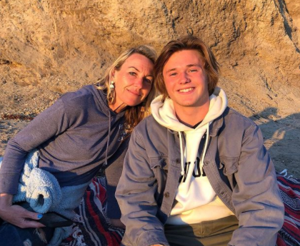 Sacha Carlson with his mother