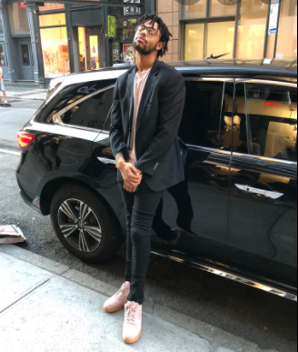D’Angelo Russell standing outside his car