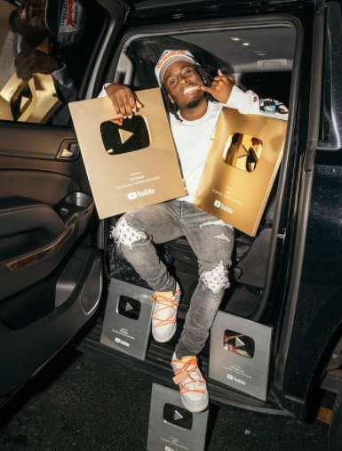 Kai Cenat posing for a photo 