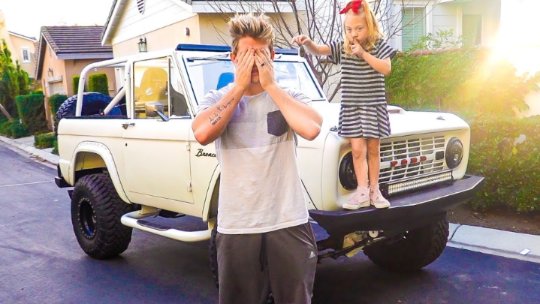 Cole LaBrant and his daughter with their car