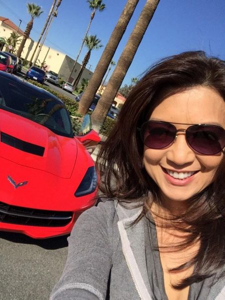 Ming-Na Wen taking selfie with her car