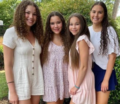 Gracie Haschak with her sisters